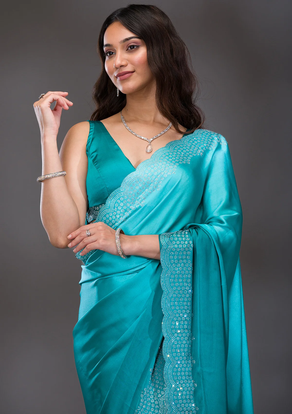 koskii-seagreen-swarovski-satin-designer-saree-saus0039496_seagreen_1_4.webp Sea Green Swarovski Satin Saree - Image 1